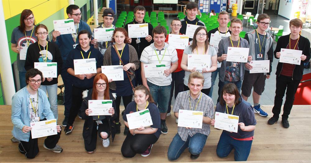 Some of the students proudly showing off their volunteering certificates