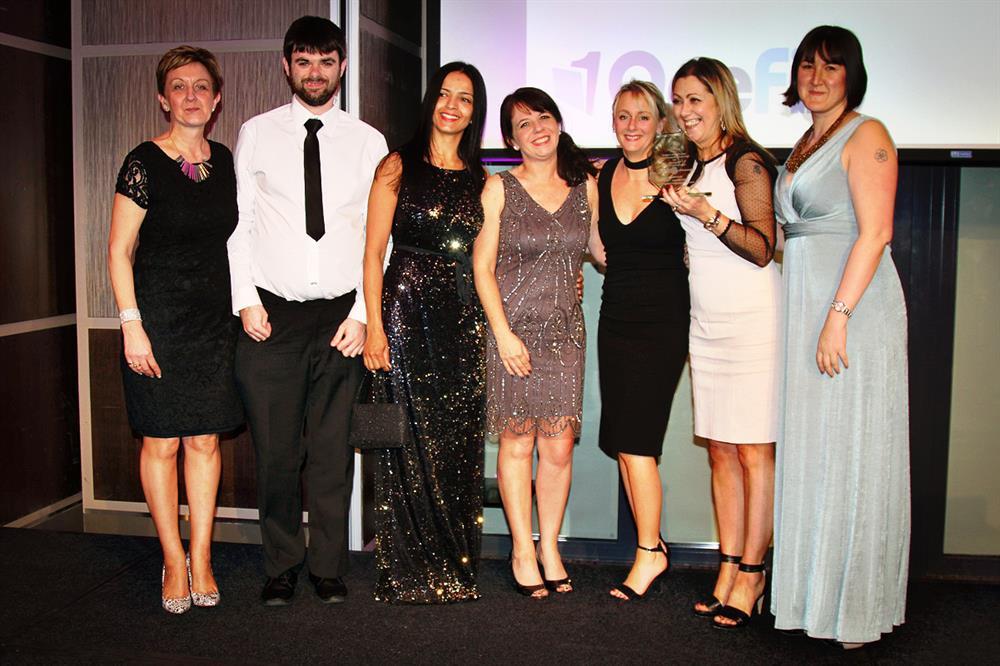 Staff from the college’s apprenticeship team celebrate their silver award joined by Alia Taub (third left), chief executive of training provider partner Management Focus Training Solutions, and Susanna Lawson, (right) director of sponsor OneFile Ltd.