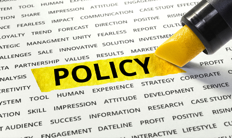 A policy document being highlighted