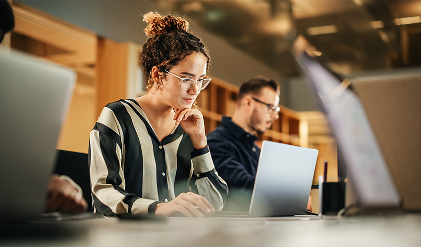 Image of a woman using a laptop.