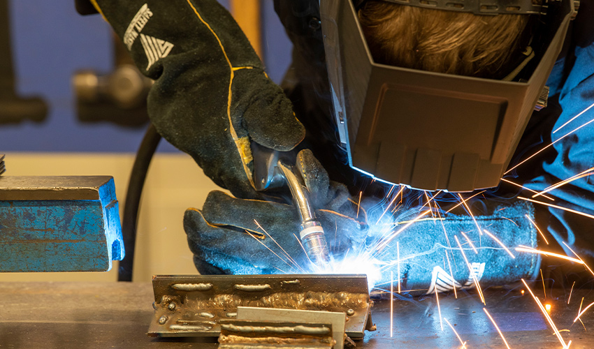 An image of a student welding.