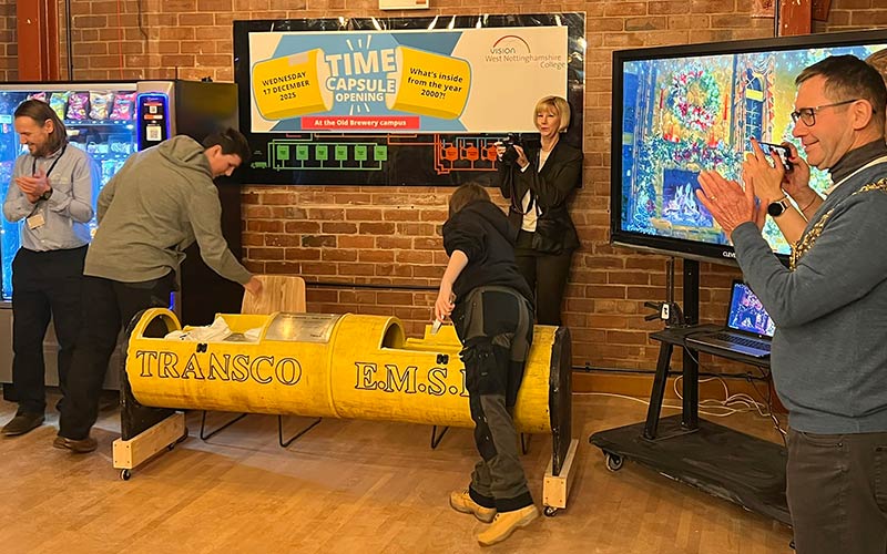 Level 1 carpentry students James Dobb and Brooke Vaughan opened up the capsule