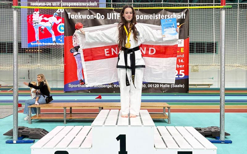 Caroline celebrating on the podium in Germany