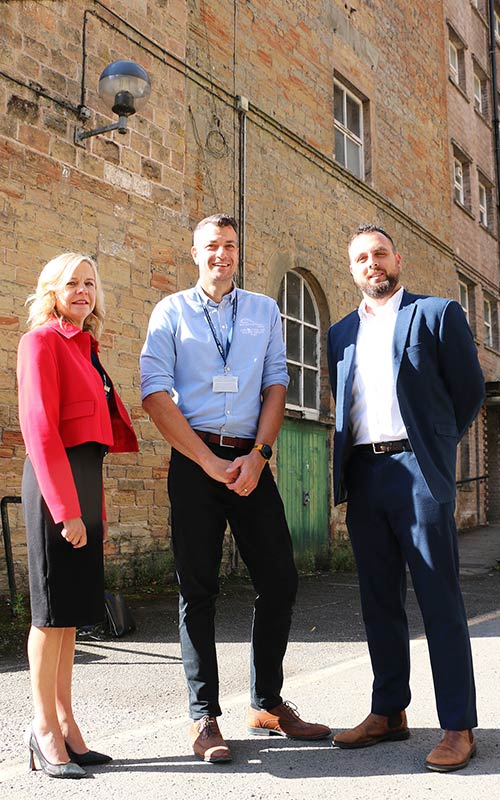 Left to right vice principal Diane Booth apprenticeship manager Paul Stringer Johnathan Price at the Pleasley Mills site