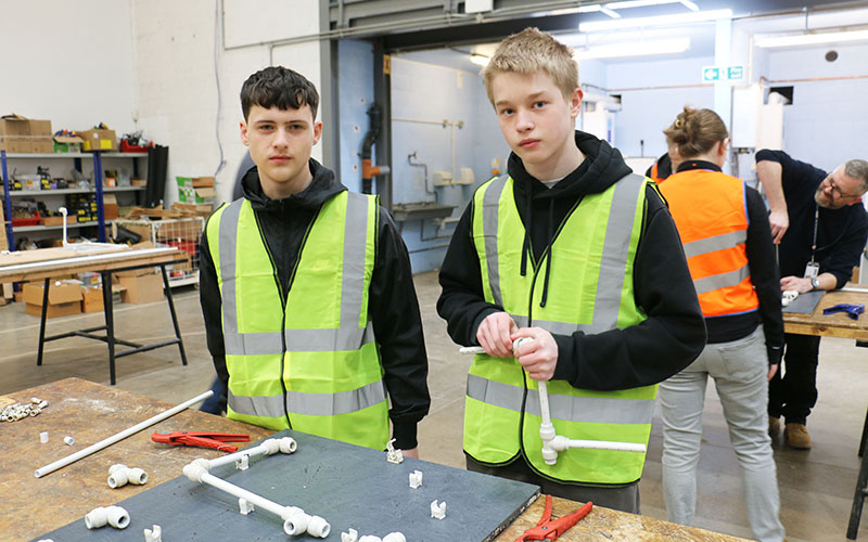 Bradley vincent and Ethan Ashmore try pipe connecting using plumbing techniques