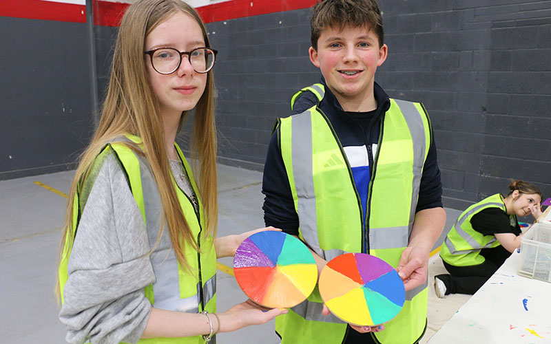 Queen Elizabeth Academys Freya Roome Harry Mitchell create a colour wheel in the decorating activity