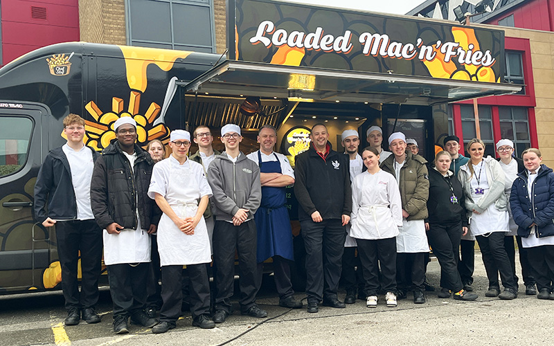 Professional chef students with Mark at his catering van