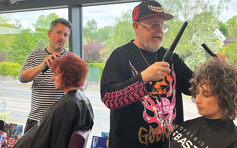 Students were able to ask the stylists questions as they worked