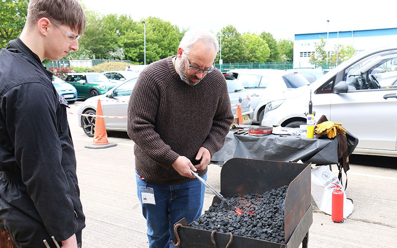 Graham has a mobile furnace which gets the metal to the right temperature for shaping