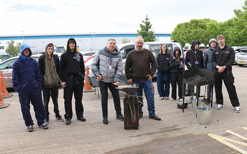 Students and staff enjoyed the practical demonstration by blacksmith Graham.JPG