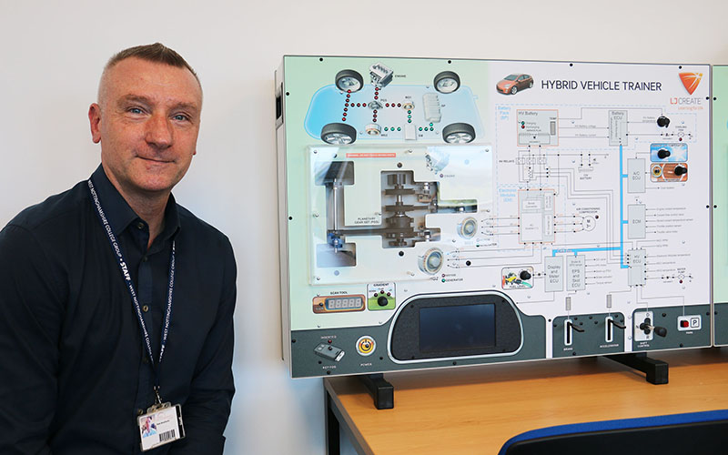 Head of automotive Pete Brochocki in the vehicle simulation training room