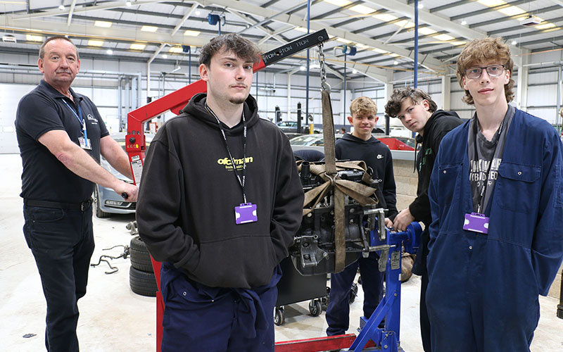Level 3 students working on an engine for their final assessments