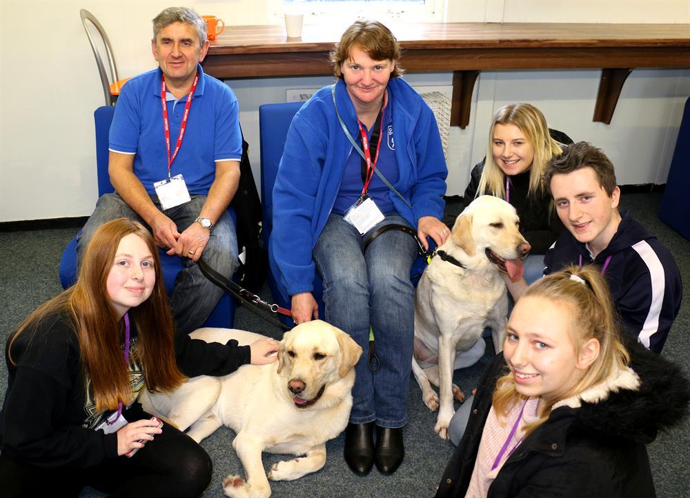 Guide dogs and their owners visited the college