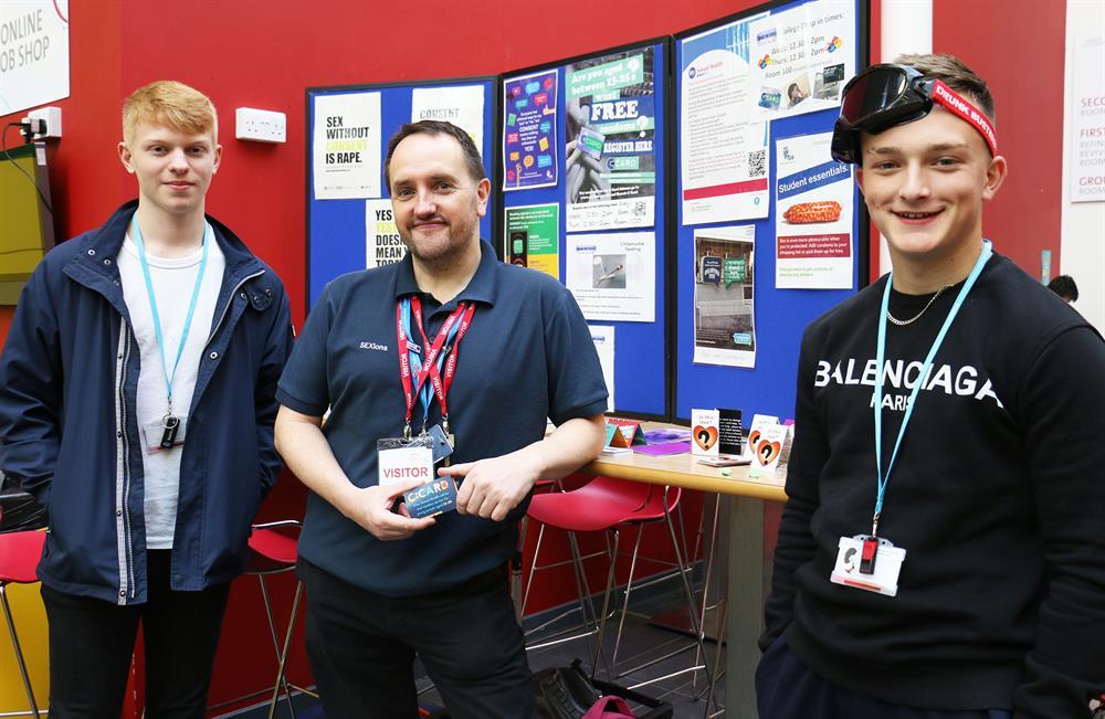 (left to right) IT student Joseph Stain, SEXions advisor Phil Eardley and IT student Owen Shaw who tried the 'beer goggles'