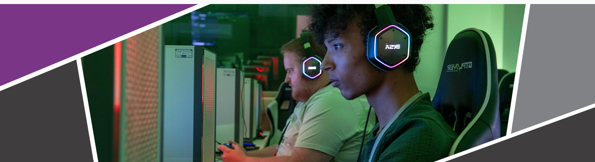 An image of students playing games on pcs, with headphones on.