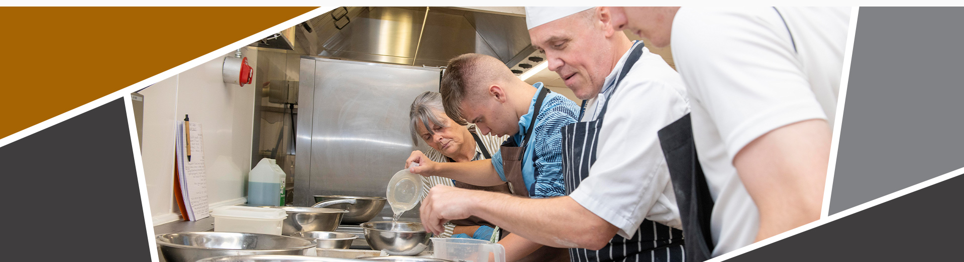 An image of chefs and students cooking and preparing ingredients in a kitchen.