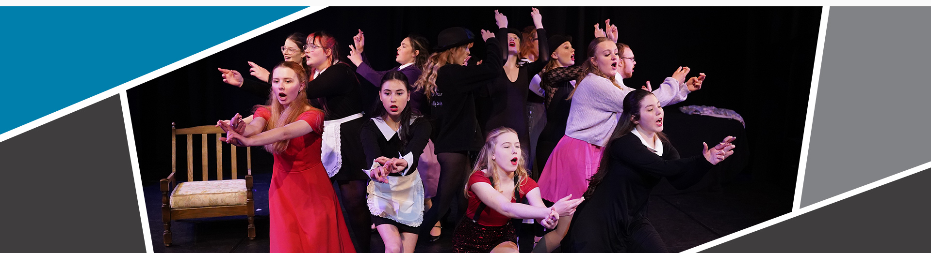 An image of a group of performing arts students performing a show.