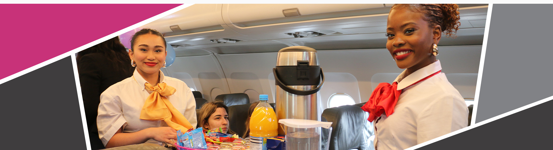 An image of students in an airplane cabin with a hospitality trolley.