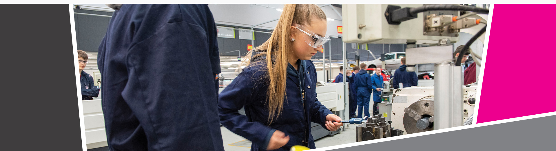 An image of a girl using a lathe with a boy stood beside her observing.