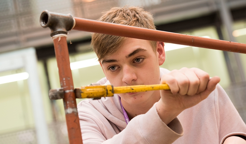 Plumbing students get to grips with all the tools they will be using daily in industry.