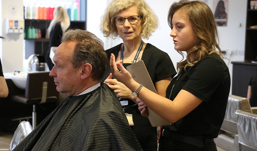 Barbering students have been busy promoting their learning company, College Cuts, to boost sales and practice their new skills.